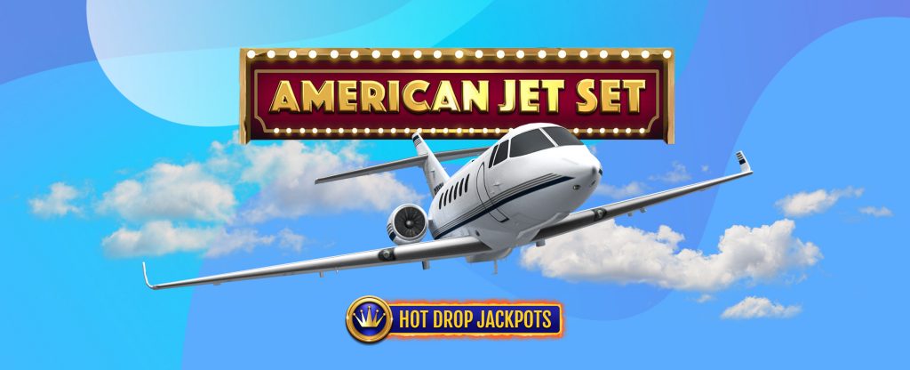 A 3D-animated small jet airplane is pictured flying in front of clouds against a blue background, while the logo from SlotsLV’s slot game called American Jet Set hangs overhead, with a smaller logo below featuring a golden crown, and the words “Hot Drop Jackpots”.