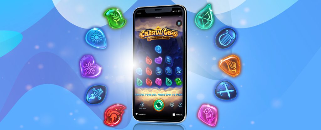 We see a 3D-animated mobile phone in the middle of the image, surrounded by various gem-like symbols from the SlotsLV slots game, Celestial Gems. Featured on the phone screen is the game itself, showing rows of various colored gems, hovering between clouds. In the background are blue, multi-toned abstract shapes.