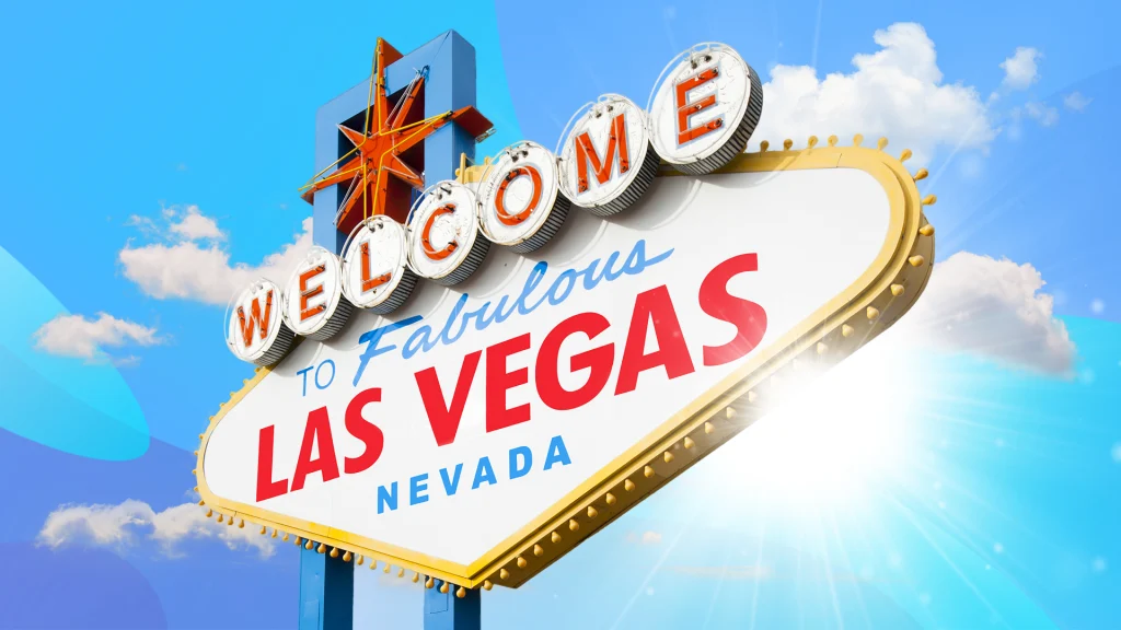 A retro sign reads ‘welcome to fabulous Las Vegas Nevada’, set against a sky backdrop.