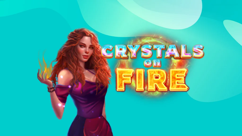 On a teal background, the words ‘Crystals on Fire’ are inside a burning ring of fire. It’s next to a sorceress in a crimson gown with long red hair.