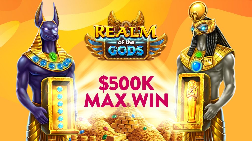 Realm of the God logo and main characters featured over a golden/yellow background with $500k Max Win text in the center.