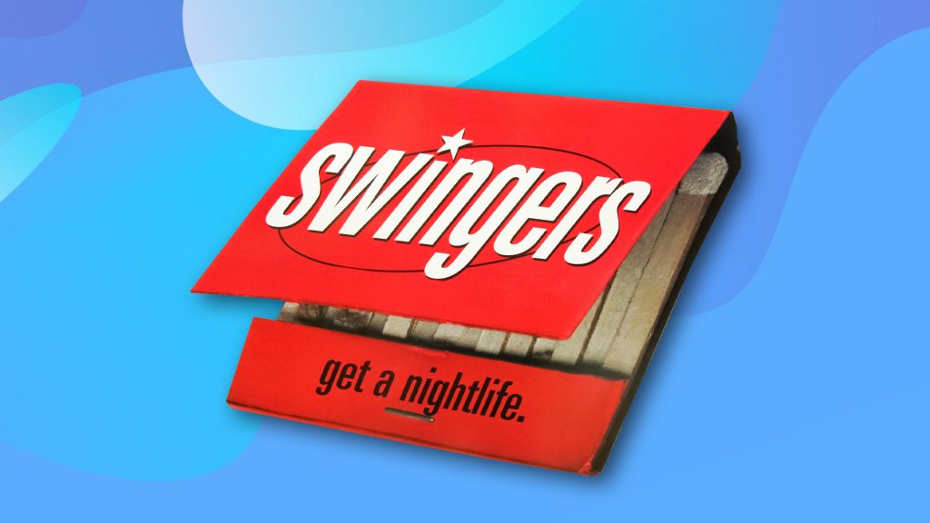 “Swingers” is written on a red matchbox, and on the bottom it says, “get a nightlife.” It’s lying on a blue background.